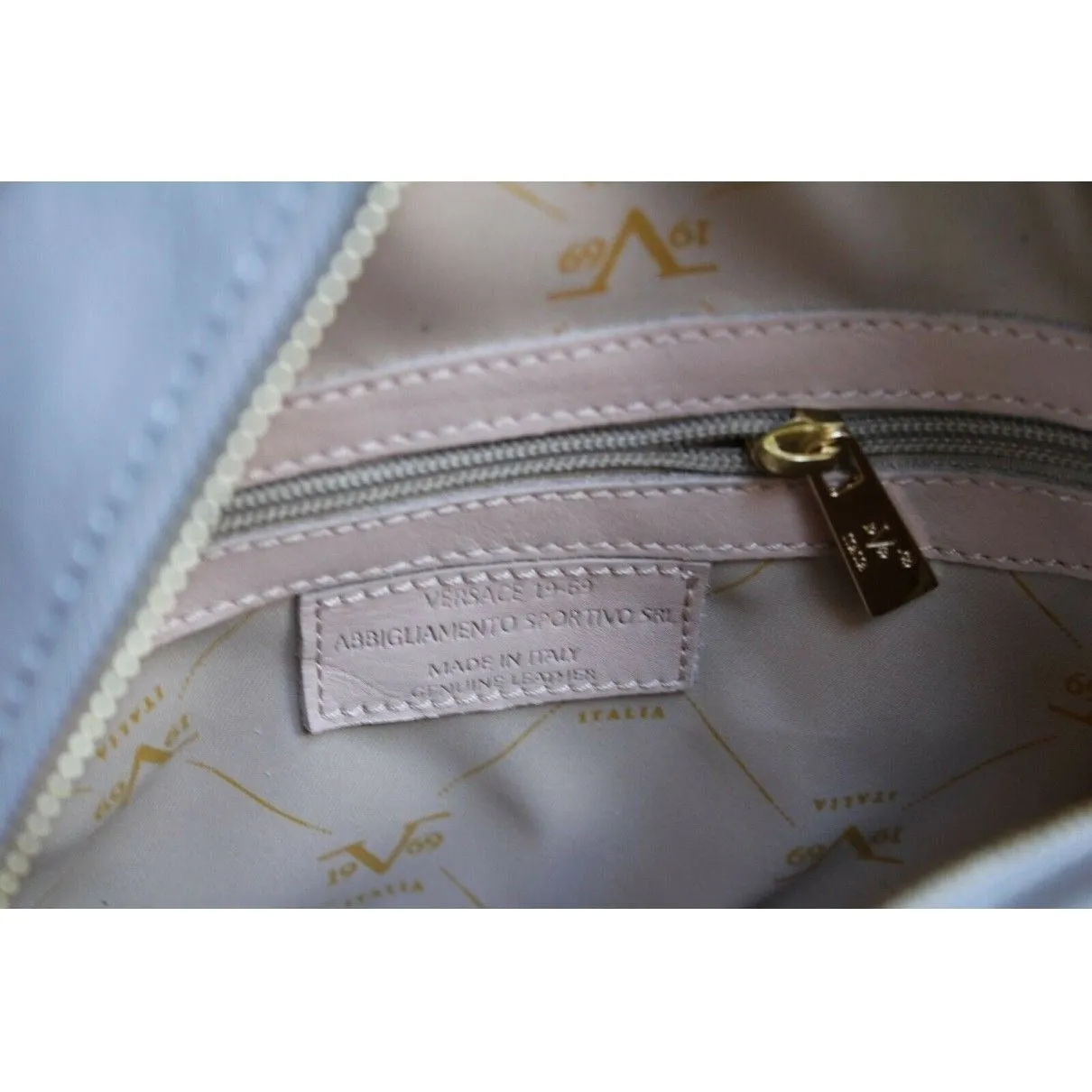 NWT, Versace, dove gray quilted leather, round, canteen style, satchel, shoulder or cross body bag with two chain and leather handles